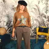 Pull étoile dorée