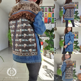 Veste en jean ornée de têtes de taureau avec fausse fourrure
